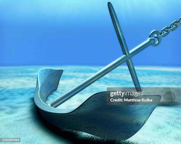 anchor on sea bed - anker stock-fotos und bilder