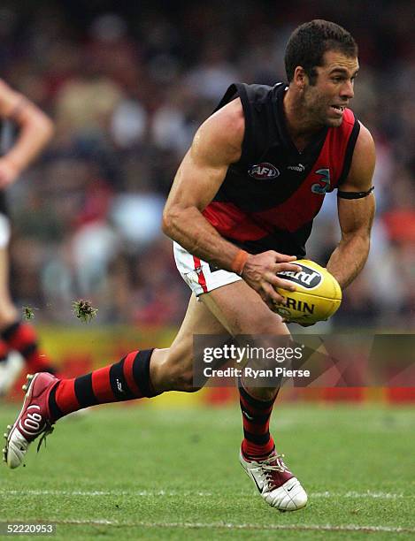 Dean Solomon for the Bombers in action during the round one AFL Wizard Cup match between the Carlton Blues and the Essendon Bombers at the Telstra...