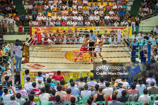 boxing match in thein phyu stadium in yangon - wrestling arena stock pictures, royalty-free photos & images