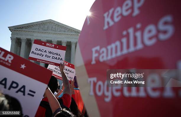 Pro-immigration activists gather in front of the U.S. Supreme Court on April 18, 2016 in Washington, DC. The Supreme Court is scheduled to hear oral...