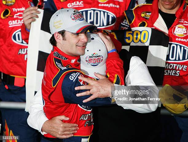 Jeff Gordon , driver of the Dupont Chevrolet, celebrates his victory with team owner Rick Hendrick during the NASCAR Nextel Cup Daytona 500 on...