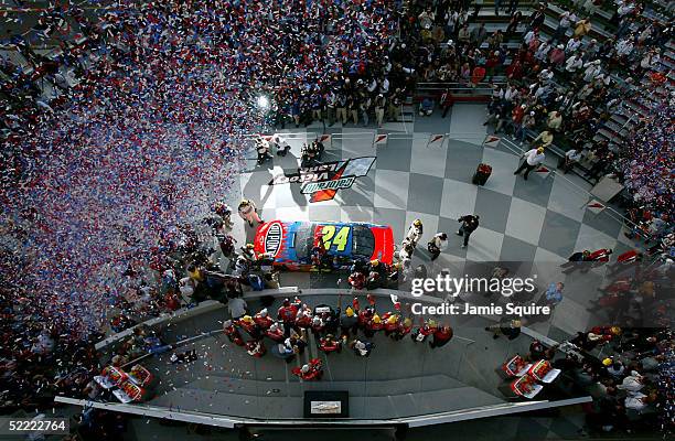 Jeff Gordon, driver of the Hendrick Motorsports Chevrolet, celebrates in Victory Lane after winning the NASCAR Nextel Cup Daytona 500 on February 20,...