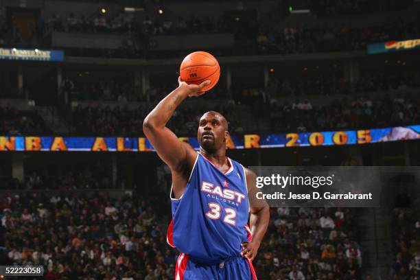 Shaquille O'Neal of the Eastern Conference All-Stars attempts a one handed free throw against the Western Conference in the 54th All-Star Game, part...