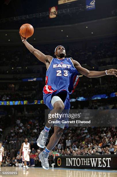 LeBron James of the Eastern Conference All-Stars goes for a dunk against the Western Conference All-Stars during the 2005 NBA All-Star Game at the...