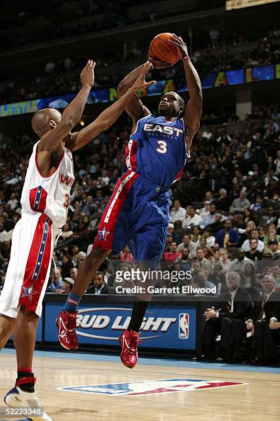 Dwyane Wade of the Eastern Conference All-Stars takes a jumper against the Western Conference All-Stars during the 2005 NBA All-Star Game at the...