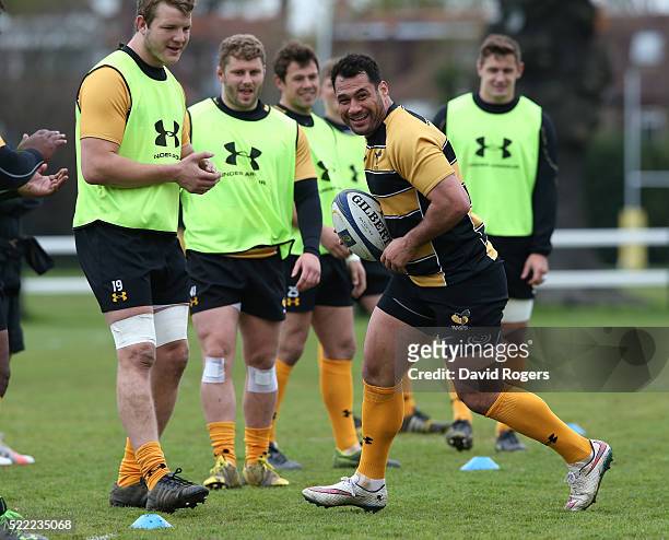 George Smith runs with the ball during the Wasps media session held at Twyford Avenue training ground on April 18, 2016 in Acton, England.
