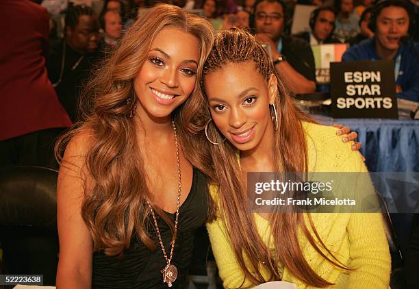 Beyonce Knowles of Destiny's Child and her sister Solange Knowles pose together at the 2005 NBA All Star Game at the Pepsi Center on February 20,...