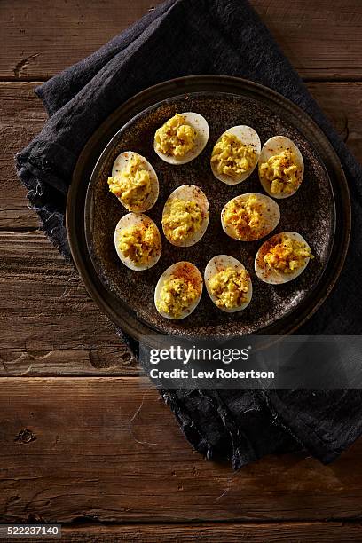 fresh deviled eggs on a tray - deviled eggs stock pictures, royalty-free photos & images