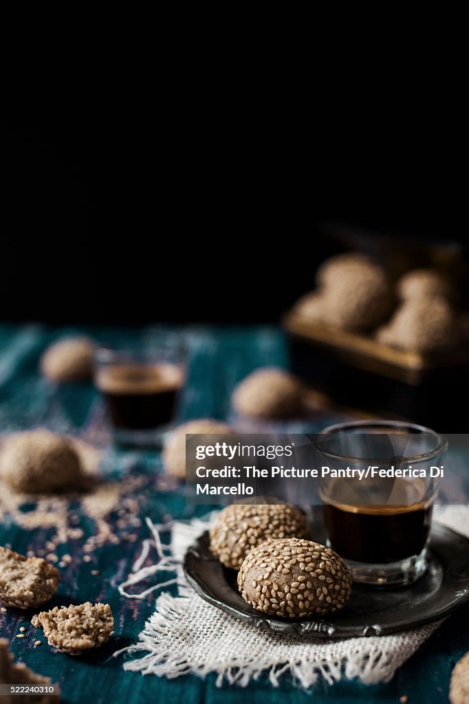 Tahini cookies. Set on a vintage wooden table