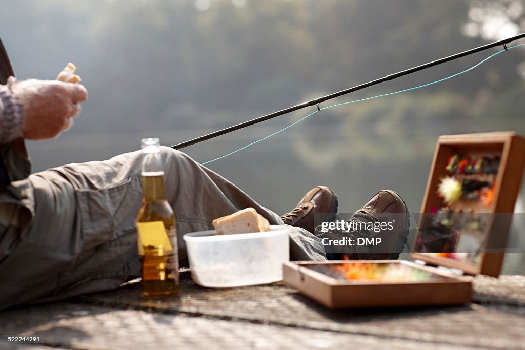 Fisherman having a meal at fishing dock