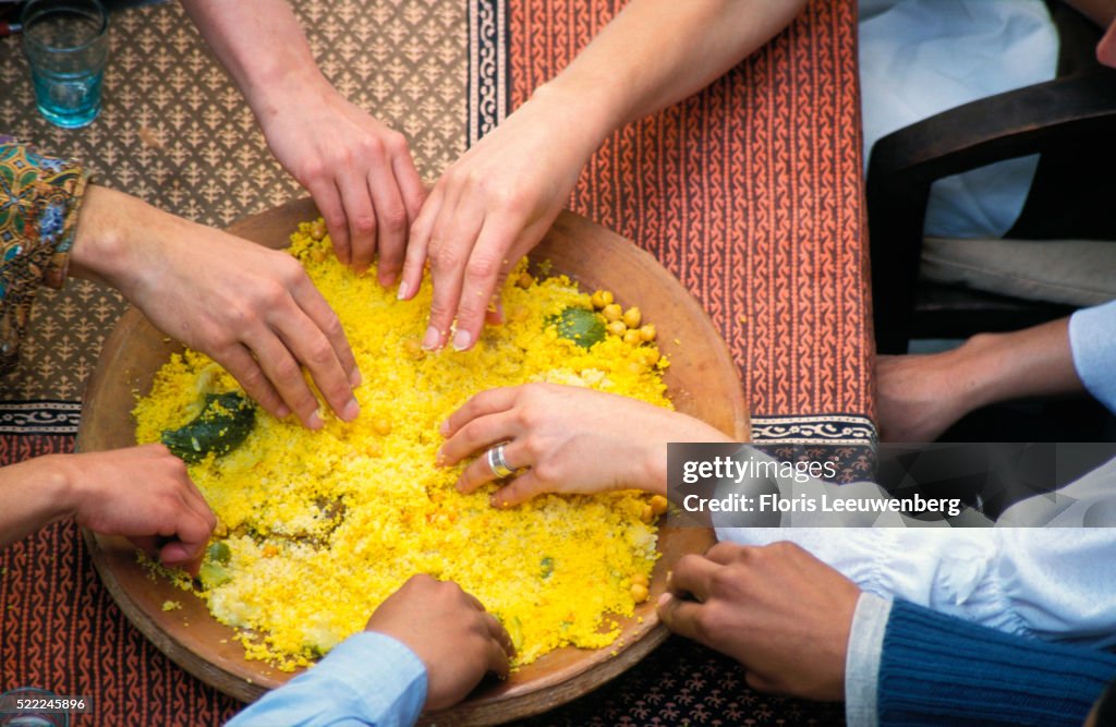 Friends Sharing Couscous