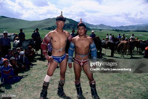 two mongolian wrestlers - nadaam festival stock pictures, royalty-free photos & images