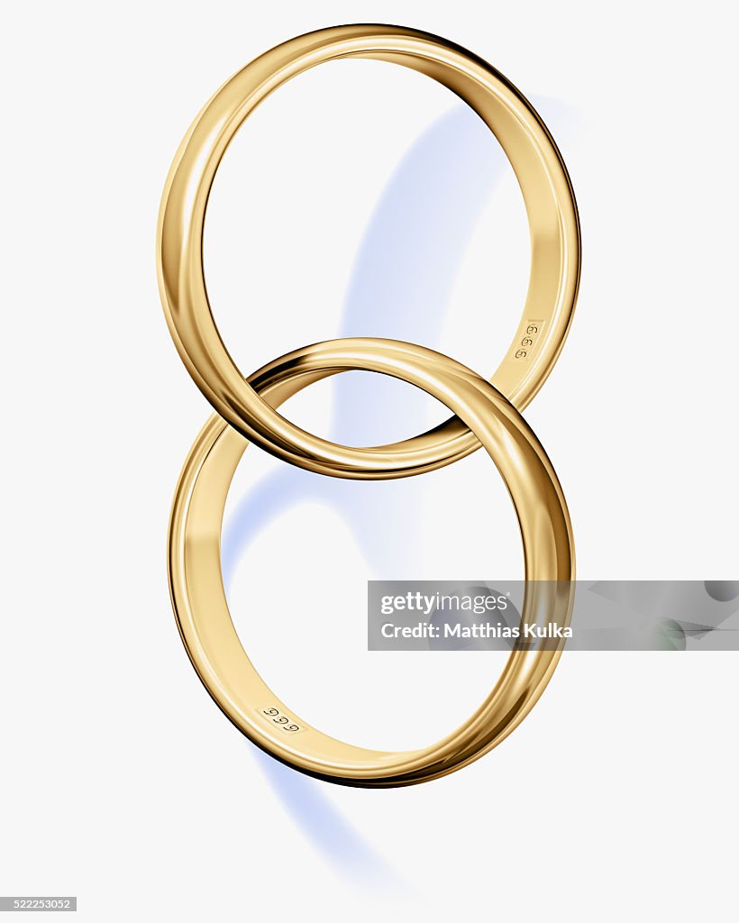 2 Interlinked Rings Two Interlocked Wedding Rings High-Res Stock Photo - Getty Images