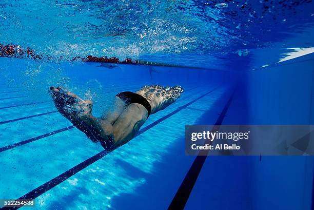 Joao De Lucca of Brazil trains in the warmup pool during the Maria Lenk Trophy competition at the Aquece Rio Test Event for the Rio 2016 Olympics at...