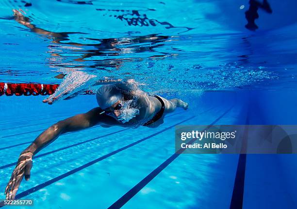 Joao De Lucca of Brazil trains in the warmup pool during the Maria Lenk Trophy competition at the Aquece Rio Test Event for the Rio 2016 Olympics at...