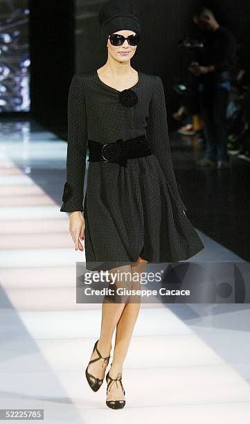 Model walks down the runway at the Emporio Armani fashion show as part of Milan Fashion Week Autumn/Winter 2005/06 at "Armani Theatre" on February...