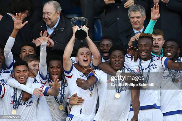 Charlie Colkett of Chelsea FC lifts the UEFA Youth League trophy in celebration after victoy in the UEFA Youth League Final match between Paris Saint...
