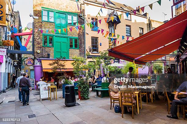 view of neal's yard - sidewalk cafe stock pictures, royalty-free photos & images