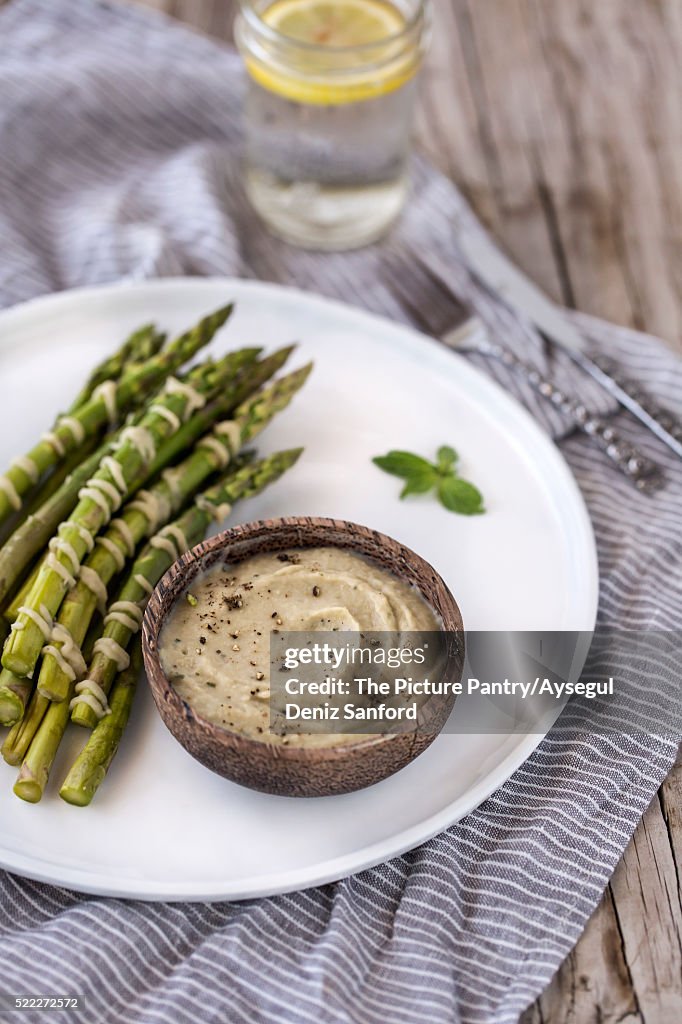 Steamed Asparagus served with White Bean and Artichoke Aioli Dip