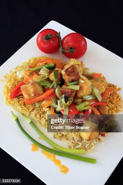 thai stir-fried crispy tofu with noodles, - crispy tofu stock pictures, royalty-free photos & images