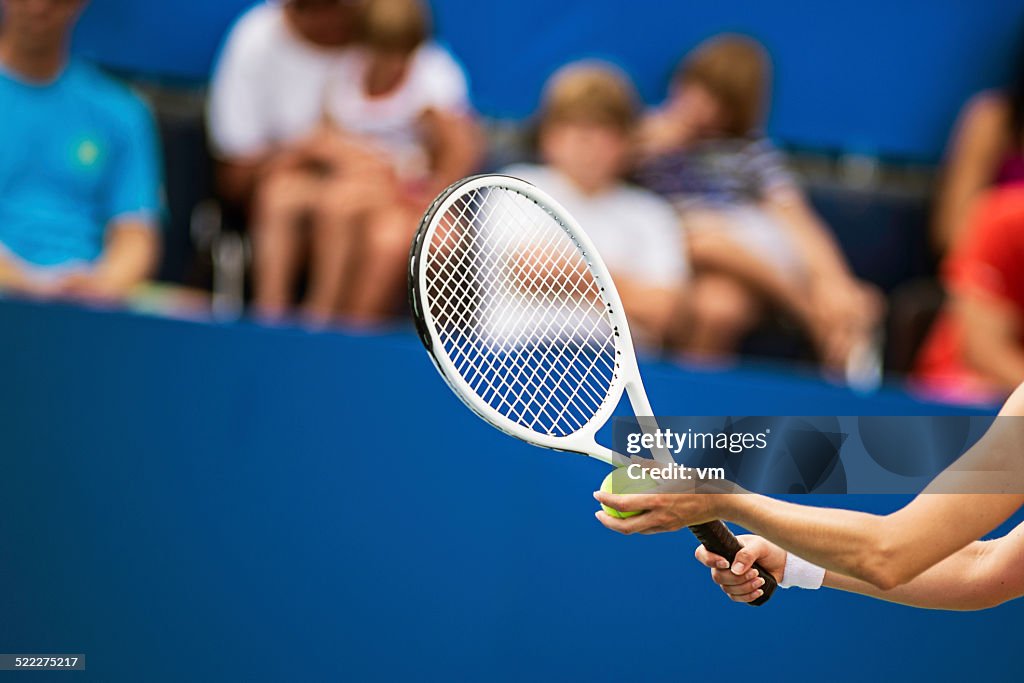 Hands of Professional Female Tennis Player to Serve