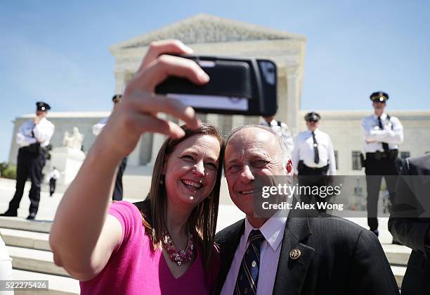 Of Tea Party Patriots Jenny Beth Martin takes a selfie with U.S. Rep. Steve King in front of the U.S. Supreme Court April 18, 2016 in Washington, DC....