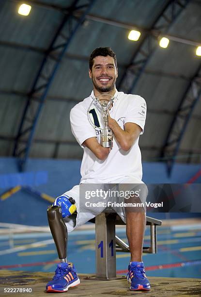 Laureus Ambassador Daniel Dias poses with his Laureus World Sportsperson of the Year with a Disability Award on April 12, 2016 in Braganca...