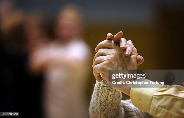 Senior Citizens take part in the Kelvinside weekly tea dance, 22 February 2005, Glasgow, Scotland. There are 11.22 million pensioners in the UK -...