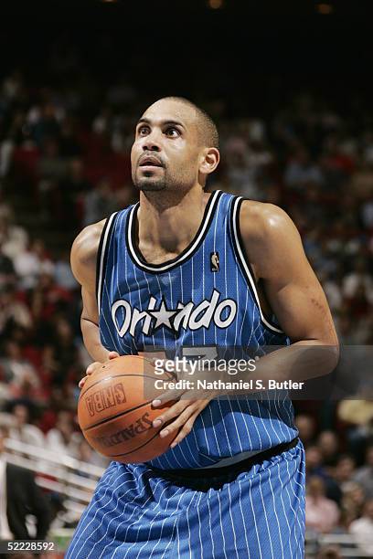 Grant Hill of the Orlando Magic shoots a free throw during the game with the Cleveland Cavaliers at TD Waterhouse Centre on February 1, 2005 in...
