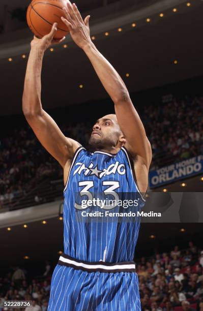 Grant Hill of the Orlando Magic shoots the ball during the game with the Cleveland Cavaliers at TD Waterhouse Centre on February 1, 2005 in Orlando,...