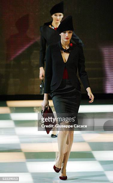 Models walk down the runway at the Giorgio Armani fashion show as part of Milan Fashion Week Autumn/Winter 2005/06 at Armani Theatre on February 22,...
