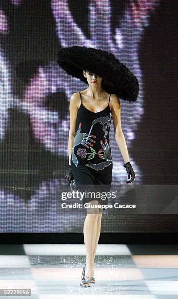 Model walks down the runway at the Giorgio Armani fashion show as part of Milan Fashion Week Autumn/Winter 2005/06 at Armani Theatre on February 22,...