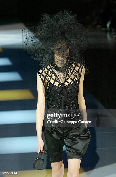 Model walks down the runway at the Giorgio Armani fashion show as part of Milan Fashion Week Autumn/Winter 2005/06 at Armani Theatre on February 22,...