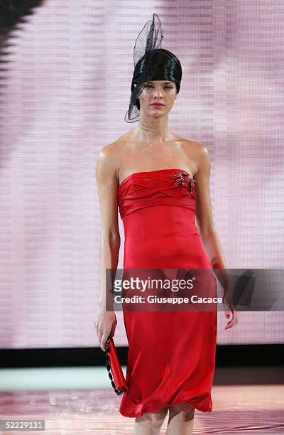 Model walks down the runway at the Giorgio Armani fashion show as part of Milan Fashion Week Autumn/Winter 2005/06 at Armani Theatre on February 22,...