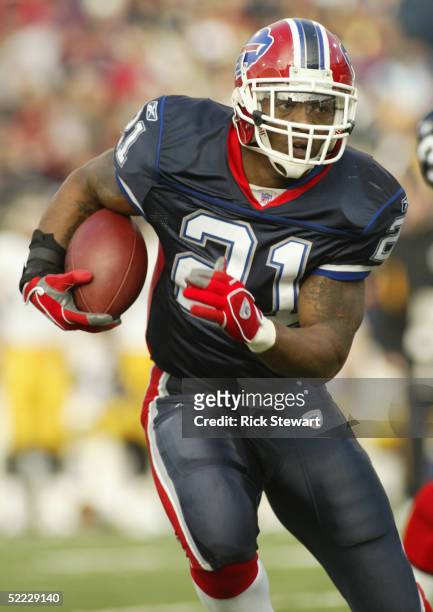 Running back Willis McGahee of the Buffalo Bills runs against the Pittsburgh Steelers on January 2, 2004 at Ralph Wilson Stadium in Orchard Park, New...