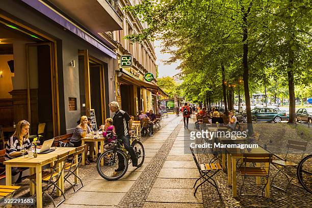 kreuzberg, pubs in schlesische strasse (street) - kreuzberg stock pictures, royalty-free photos & images
