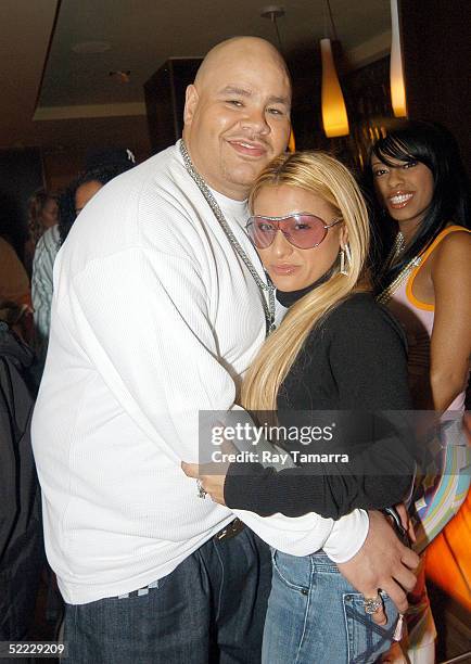 Artist Fat Joe and wife Lorena Cartegena pose for photos at his "So Much More" video shoot at Time Hotel February 22, 2005 in New York City.