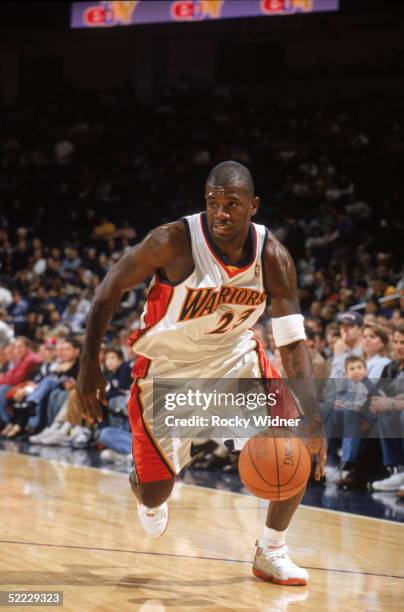 Jason Richardson of the Golden State Warriors drives against the New Orleans Hornets at The Arena in Oakland on February 4,2005 in Oakland,...