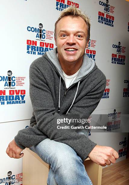 Graham Norton poses in the press room during "Comic Aid", a comedy night with proceeds going to the Disasters Emergency Committee to raise funds for...