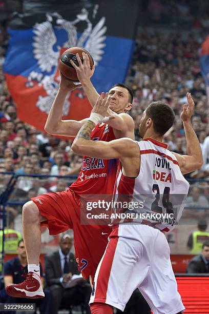 Moscow's guard Vitaly Fridzon vies with Crvena Zvezda Telekom Belgrade's guard Stefan Jovic during the Euroleague play-off basketball match between...