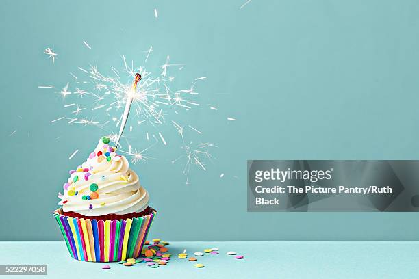 celebration cupcake with sparkler - birthday cupcake stock pictures, royalty-free photos & images
