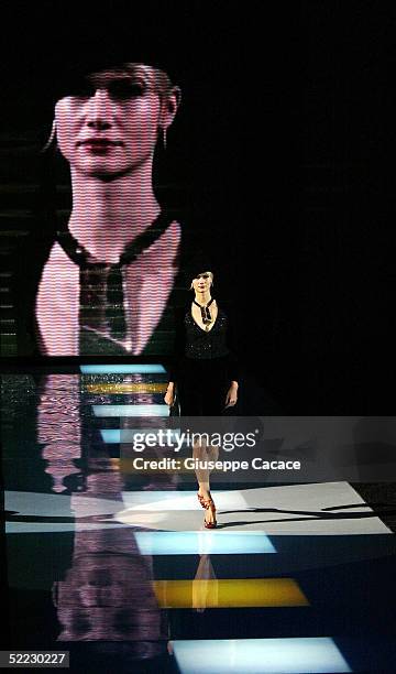 Model walks down the runway at the Giorgio Armani fashion show as part of Milan Fashion Week Autumn/Winter 2005/06 at Armani Theatre on February 22,...