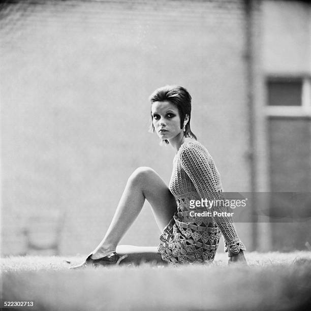 Model Lauraine Scrimaglia wearing a knitted mini dress, 25th July 1969.