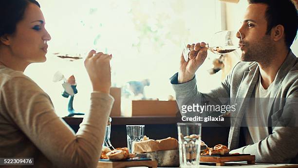 couple in restaurant. - 1 year anniversary stock pictures, royalty-free photos & images