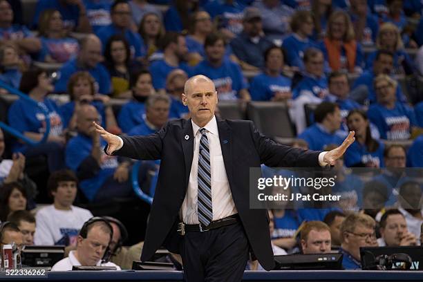 Rick Carlisle of the Dallas Mavericks calls instructions to his team as they play the Oklahoma City Thunder during the second half of Game One of the...