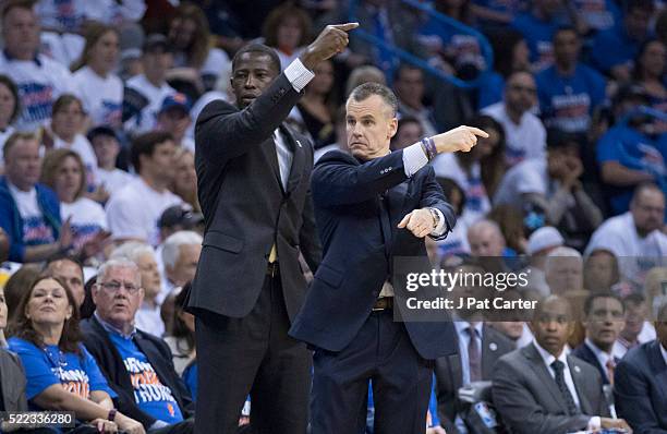 Billy Donovan of the Oklahoma City Thunder calls instructions as his team plays the Dallas Mavericks during the second half of Game One of the...