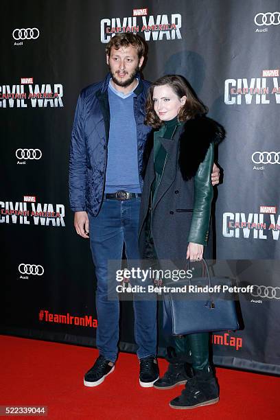 Swimmer Amaury Leveaux and his companion Elizabeth attend the "Captain America: Civil War" Paris Premiere. Held at Le Grand Rex on April 18, 2016 in...