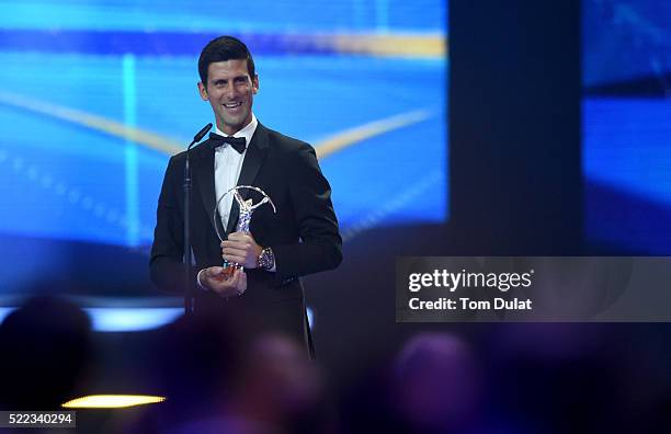 Tennis player Novak Djokovic of Serbia accepts his Laureus World Sportsman of the Year trophy during the 2016 Laureus World Sports Awards at the...