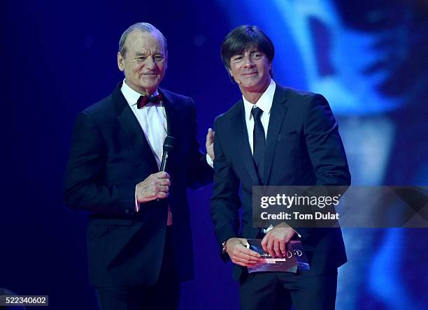 Host Bill Murray with Joachim Loew, head coach of the Germany football team during the 2016 Laureus World Sports Awards at the Messe Berlin on April...