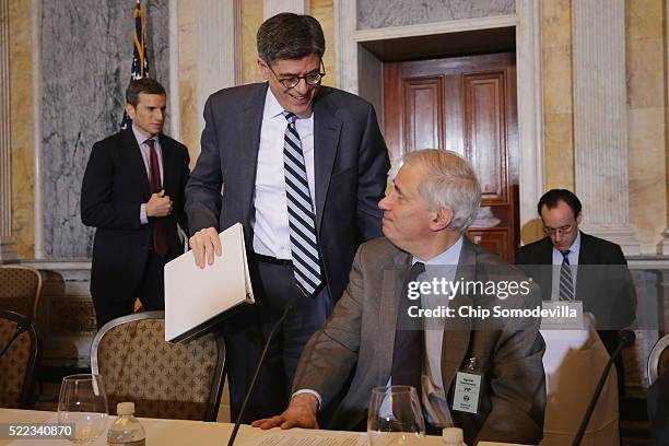 Treasury Secretary Jacob Lew and Federal Deposit Insurance Corporation Chairman Martin Gruenberg visit at the conclusion of a meeting of the...